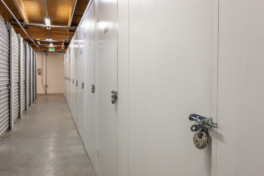 Self storage units line a hallway at Roosevelt Self Storage in Seattle, Washington. 