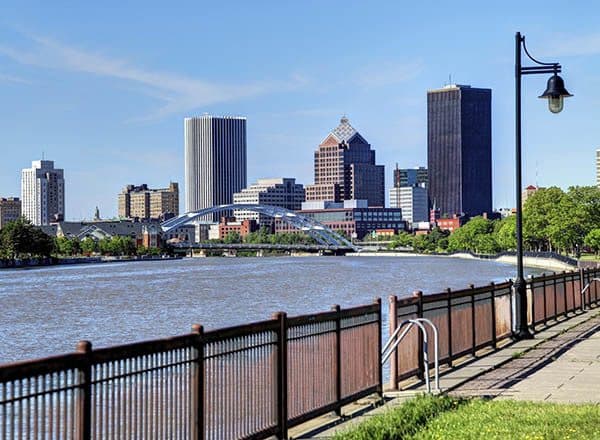 Walk along the water near Rochester City Apartments