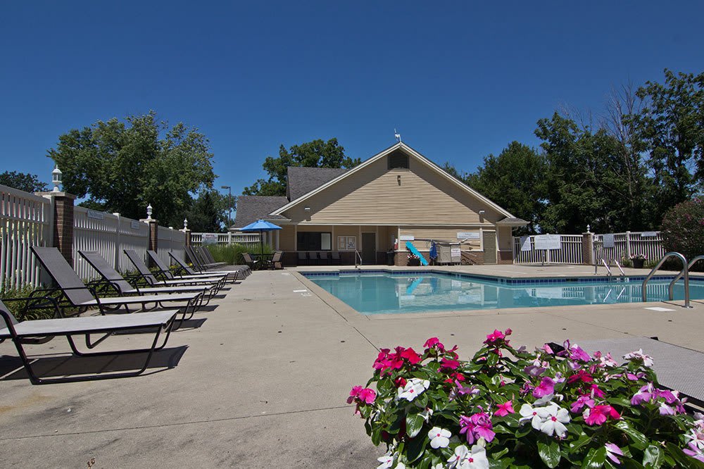 relax by the pool at summit Apartments in Fort Wayne Indiana