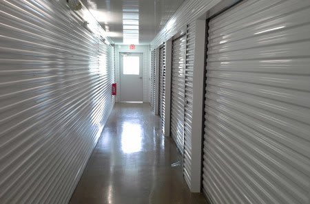 Moving truck and driver at Spring self storage