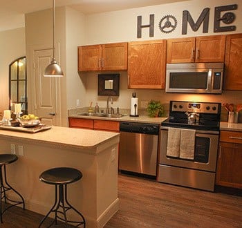 Kitchen and bar at our Plano apartments