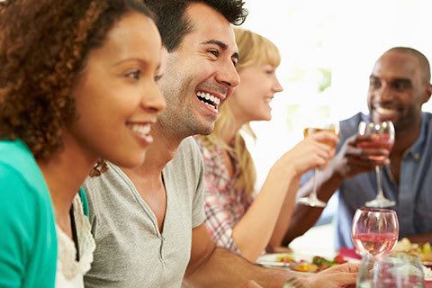 Friends enjoying dinner at our Atlanta apartments