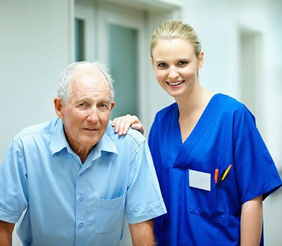 Nurse exemplifying what it means to provide excellent senior living care at Randall Residence.