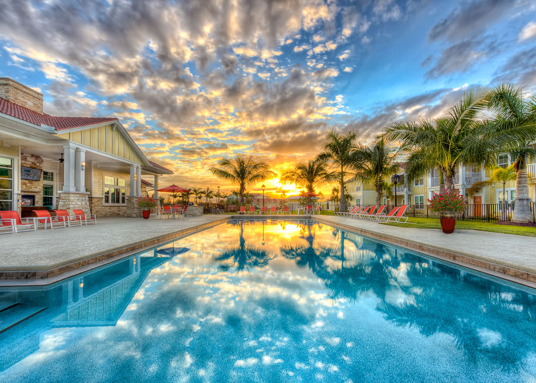 A view of the sparkling blue pool at Estero apartments