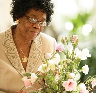 senior residents work on a puzzle in Huntsville