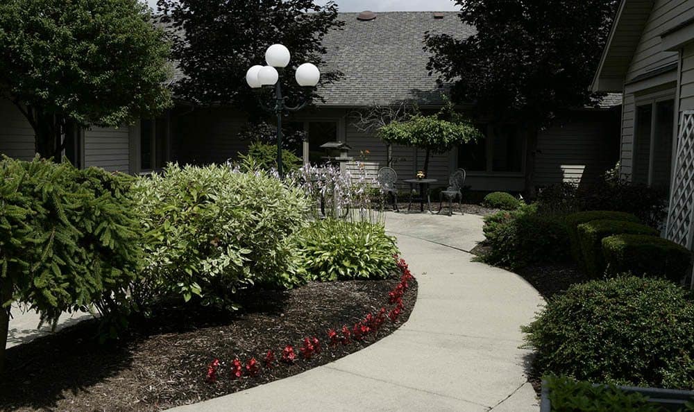 Beautiful landscaping surrounds our Auburn Hills senior living facility