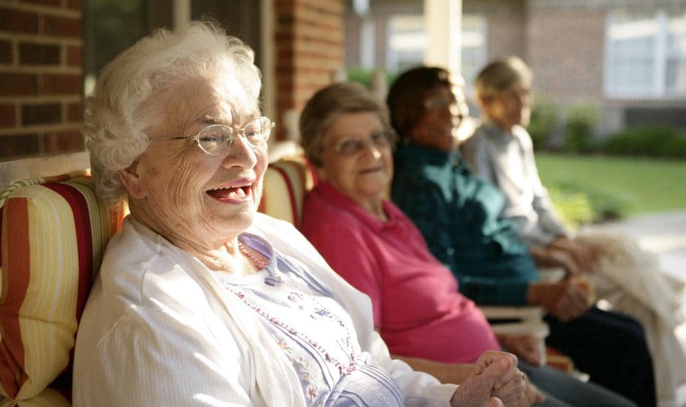 Relax outside at our senior living facility in Columbia