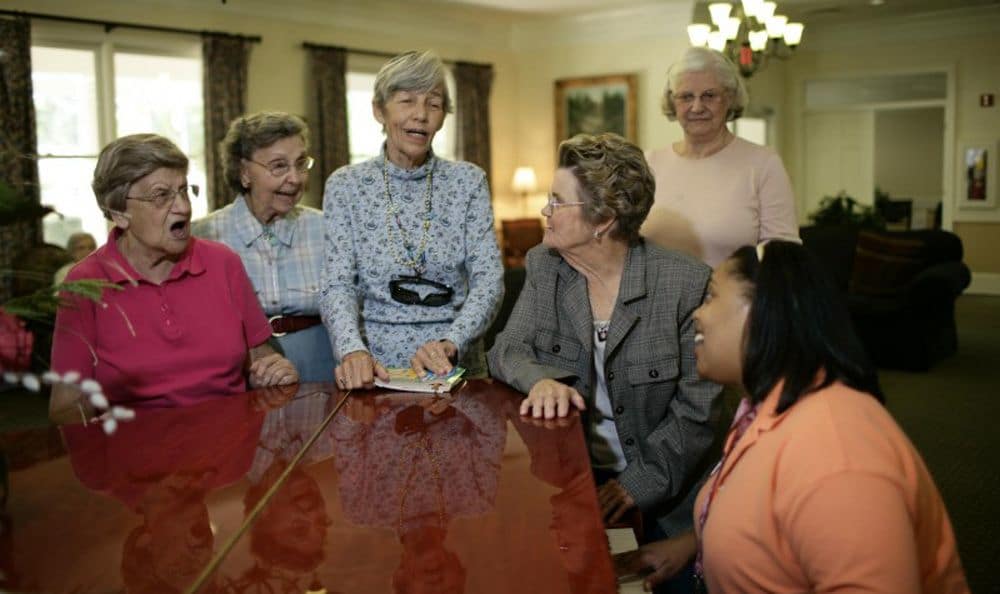 Sing with our wonderful staff at our senior living facility in Columbia