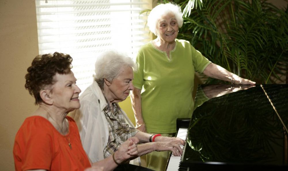 Sing with our wonderful staff at our senior living facility in Coral Springs