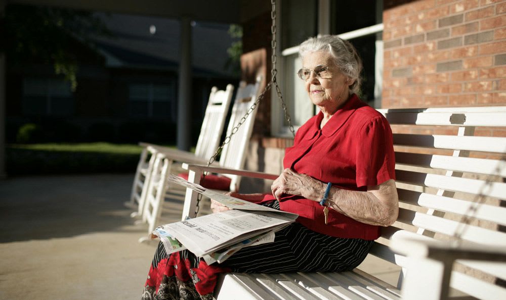 Relax outside at our senior living facility in Rock Hill