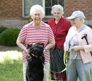 senior living resident and dog in Rock Hill