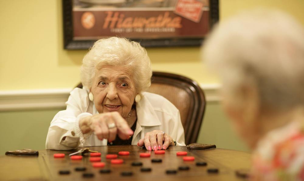 Enjoy games with friends and family at our senior living facility in Vero Beach 
