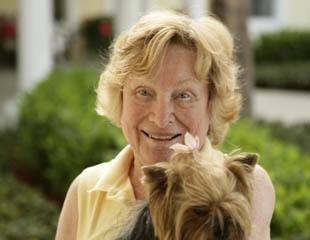 Senior living resident with dog in Vero Beach