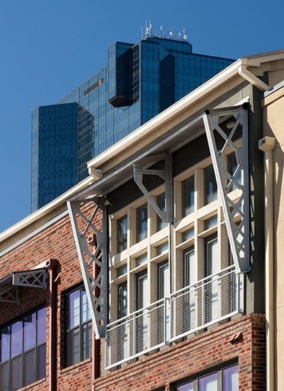 View of Richfield Village Apartments's Juliet Balconies, with some of downtown Clifton's skyscrapers in the background.