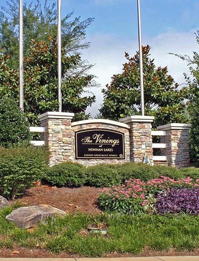 Our sign welcomes residents and their guests - and prospective residents - at our garden-style community in Newnan, GA
