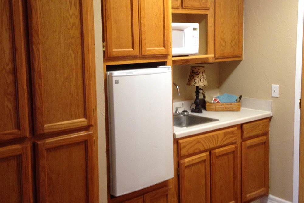 Respite care fridge and microwave at Westbrook Gardens