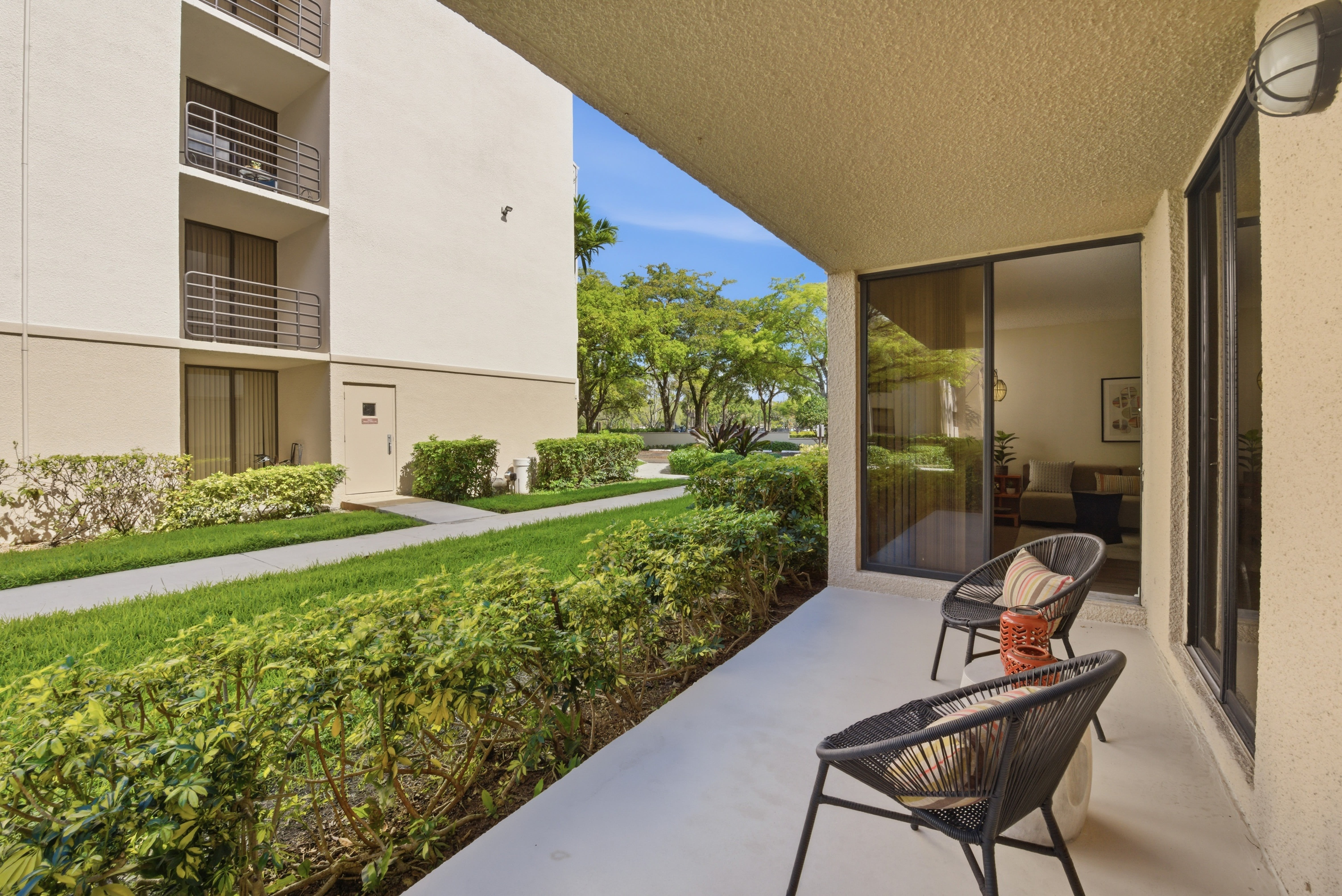 Private patio at New Barn Apartments in Miami Lakes, Florida at New Barn Apartments in Miami Lakes, Florida