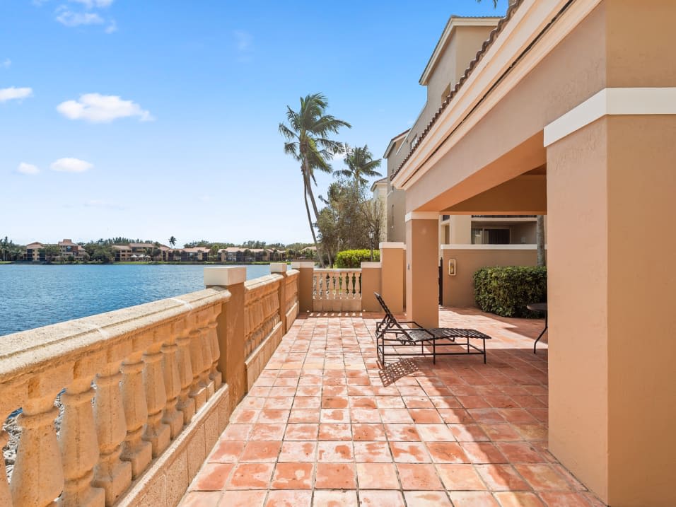 Veranda overlooking the lake at St. Tropez Apartments in Miami Lakes, Florida