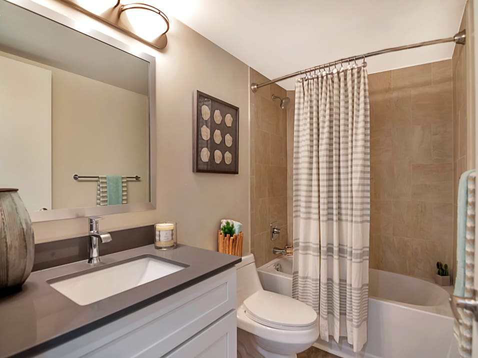 Beautiful model bathroom at St. Tropez Apartments in Miami Lakes, Florida