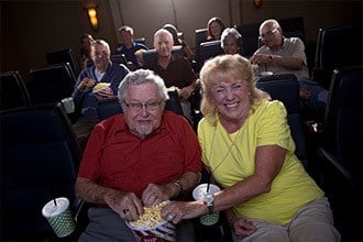 Senior living residents enjoying a film in Melbourne