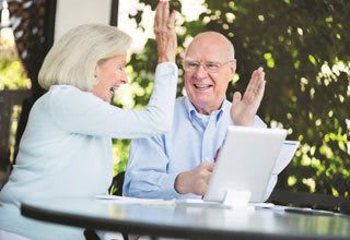 Senior living residents celebrate making the smart financial choice