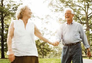 Senior living residents take a walk in nature in Florida