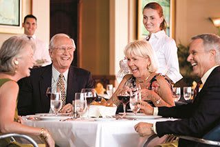 Senior living residents enjoying gourmet dining at our Naples community