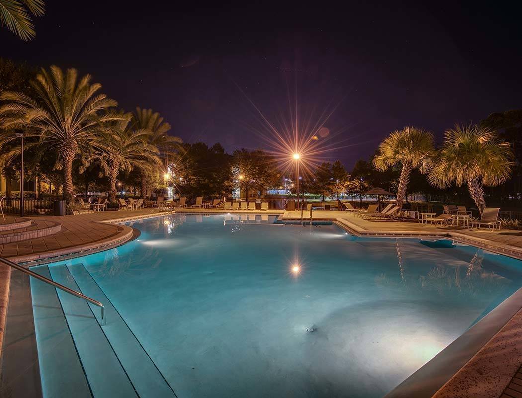 Pool photo at night at Legacy on the Bay in Destin