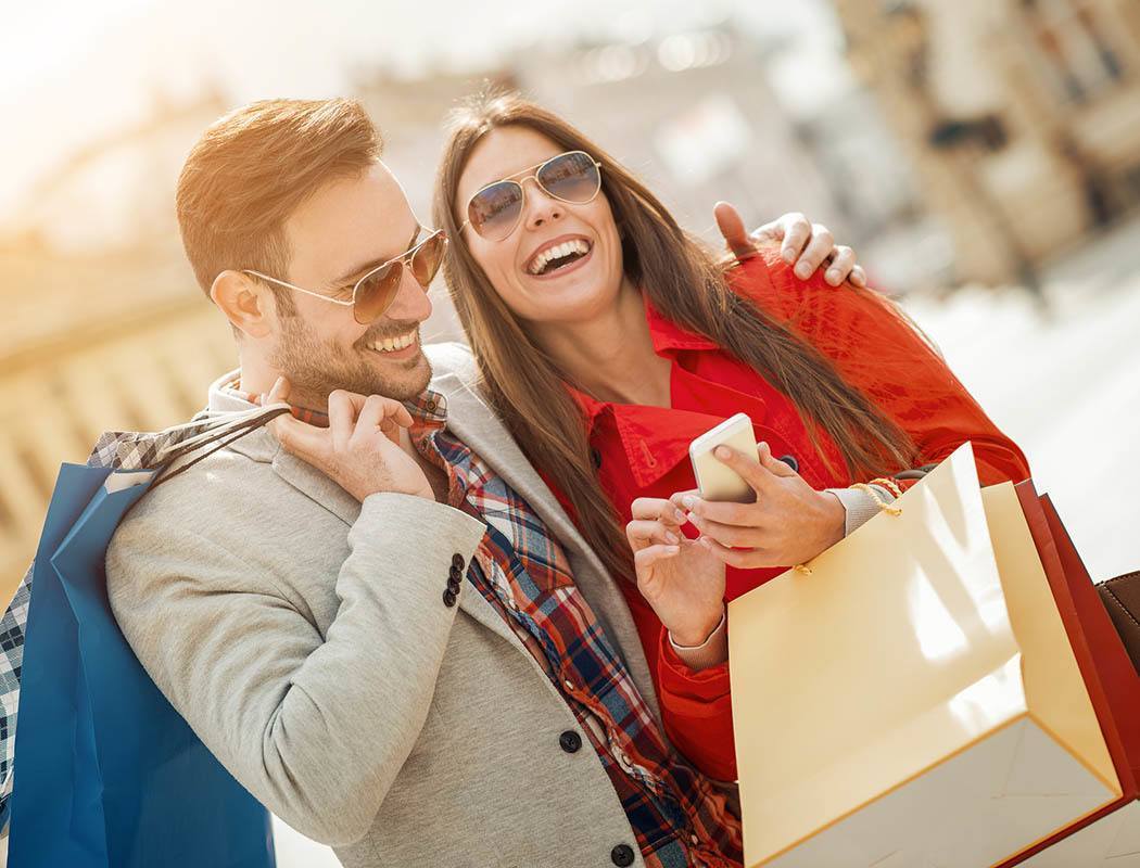 Young couple shopping in Destin near Legacy on the Bay