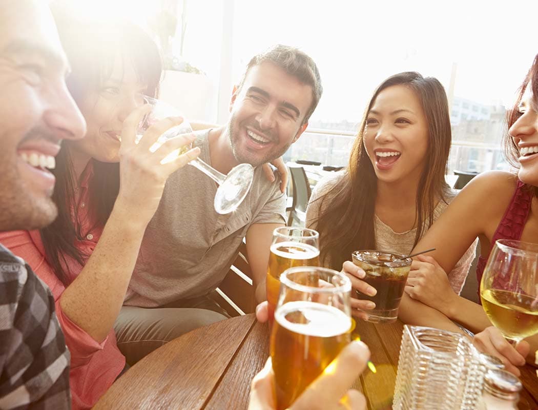 Friends having beverages in Raleigh near Legacy at Wakefield