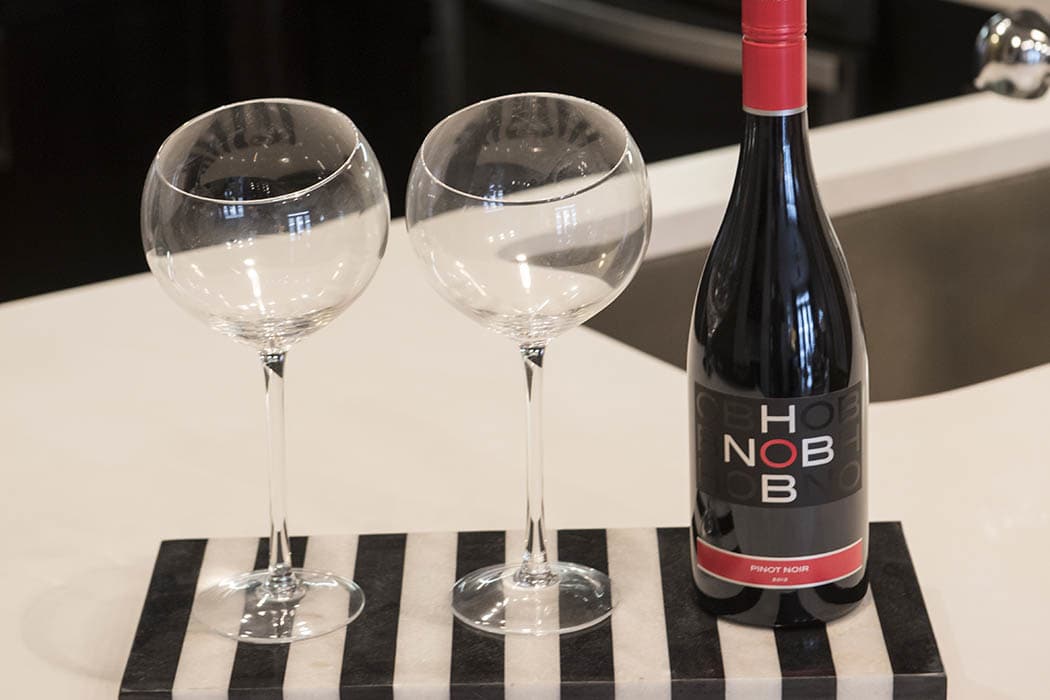 Bottle of wine and two glasses at Anthem Cityline in Richardson