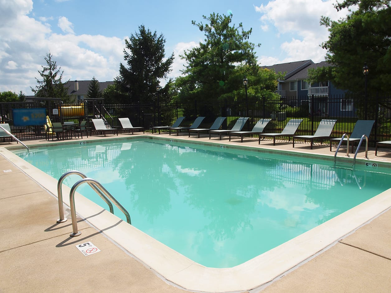 Outdoor pool at Wellington Place Apartments
