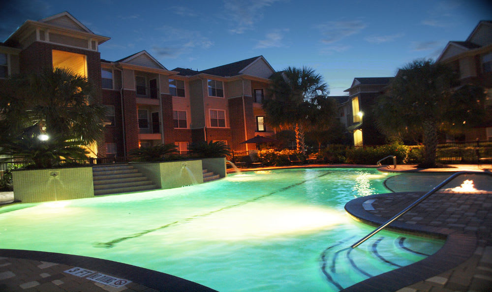 Pool view at night at Madison on the Meadow