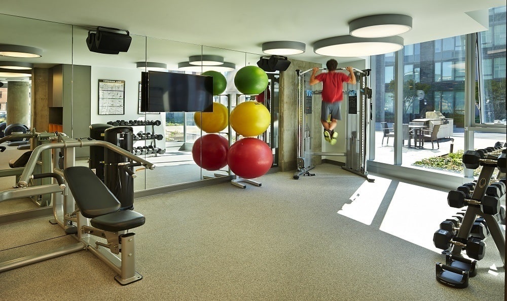 Fully equipped fitness center at The Wave at Stadium Place in Seattle, Washington