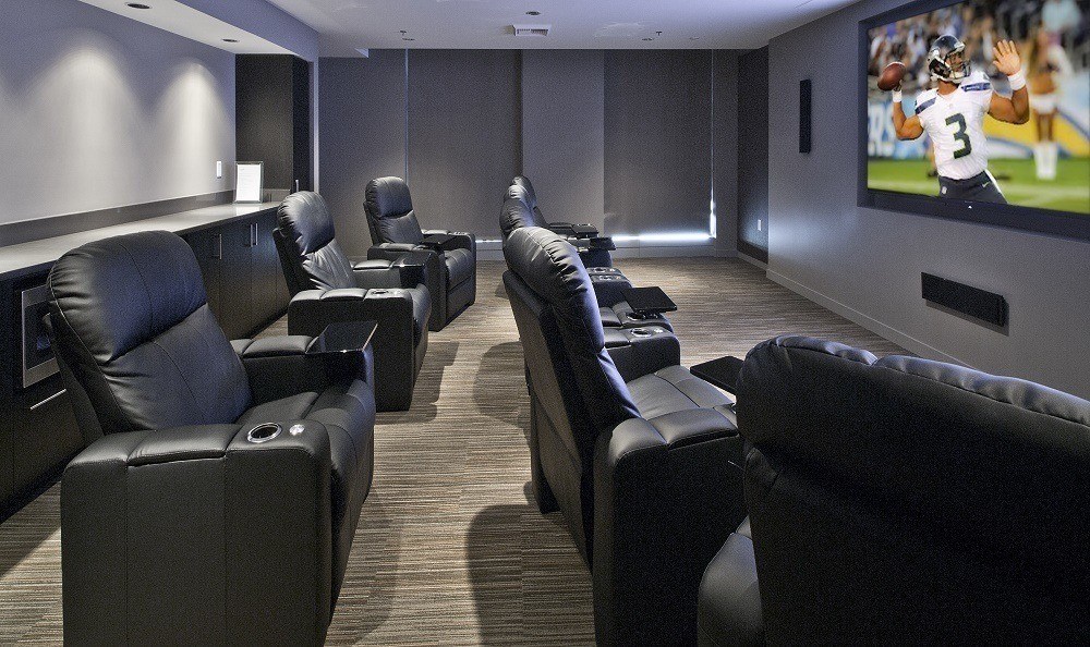 Movie theater for residents at The Wave at Stadium Place in Seattle, Washington