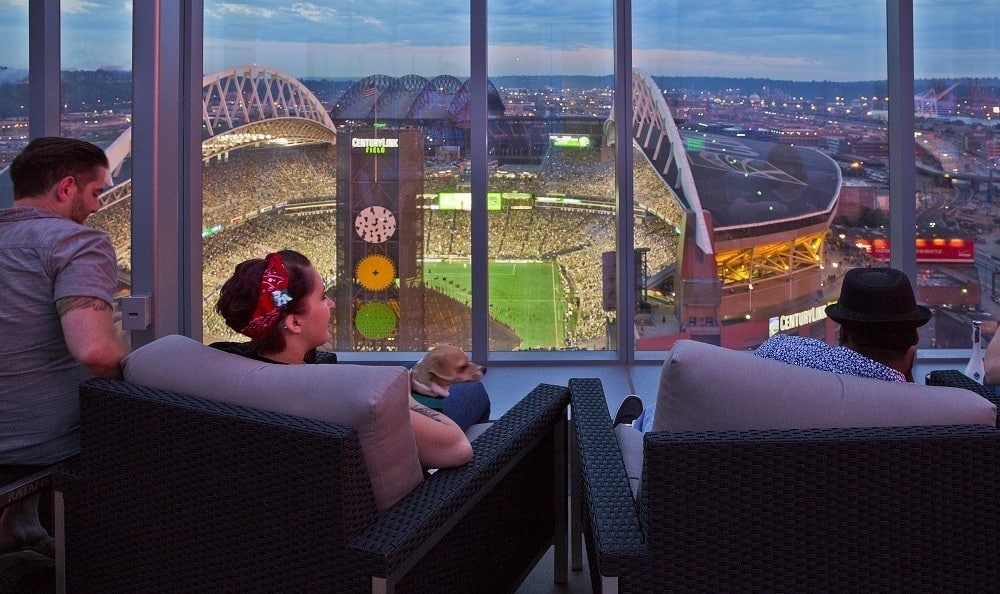 Residents enjoying the clubhouse at The Wave at Stadium Place in Seattle, Washington