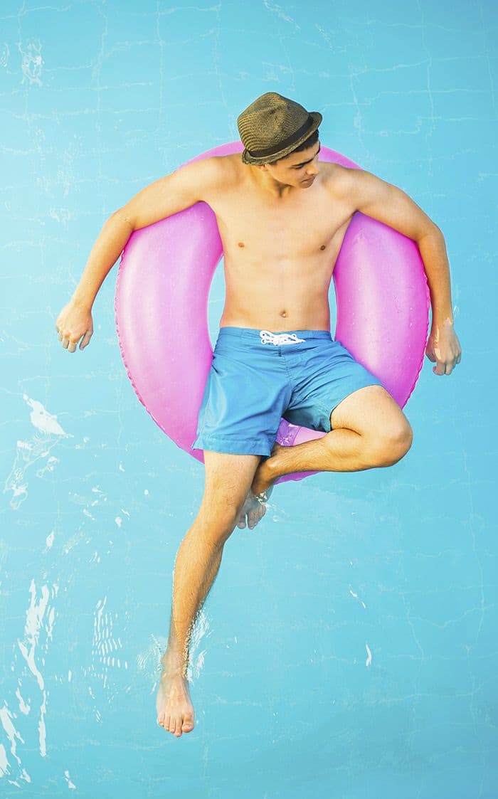 Man swimming in pool the Lexington Place in Bossier City, LA.