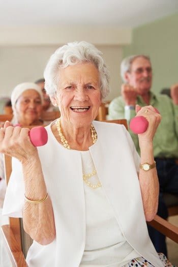 Woman exercising with weights