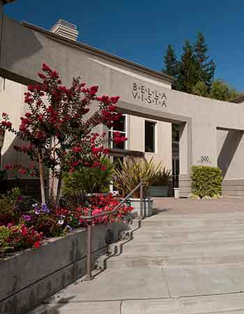 Resident enjoying coffee in Santa Clara apartments for rent