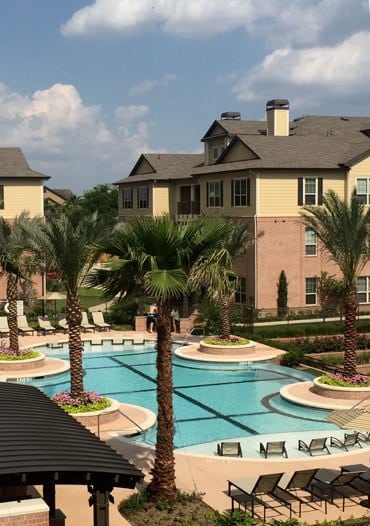 Overview of Houston with it's swimming pool and apartments for rent in Houston, TX