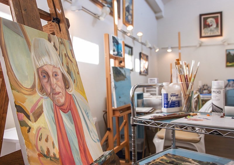Resident painting at the senior living community in Riverside