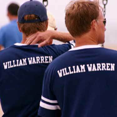 William Warren Group, two guys in baseball shirts