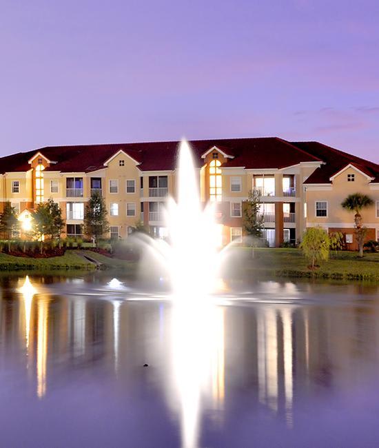 View of a pond with a fountain at WRH Realty Services, Inc