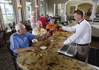 Have a beer with your buddies at our bar Aston Gardens
