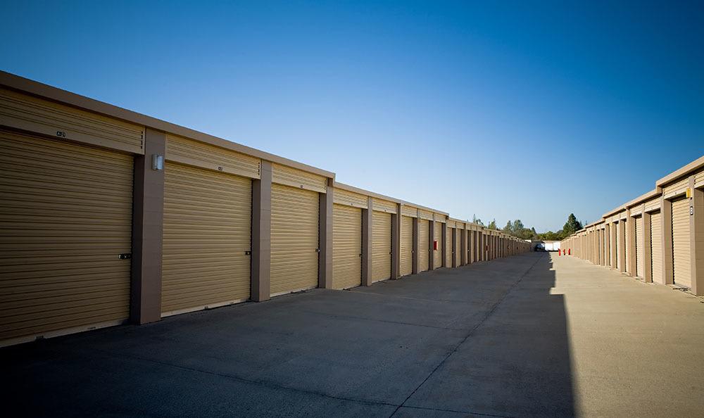 A large driveway leading to storage units at Placer Self Storage in Rocklin, California