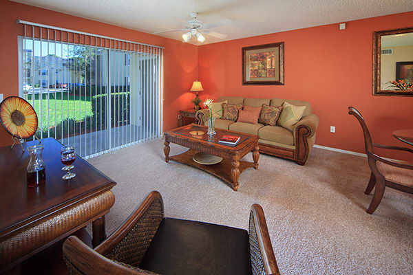 Apartment living room at The Grand Reserve at Lee Vista