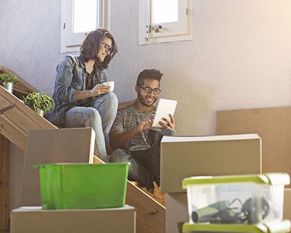 A happy couple shares packing tips thanks to Storage World