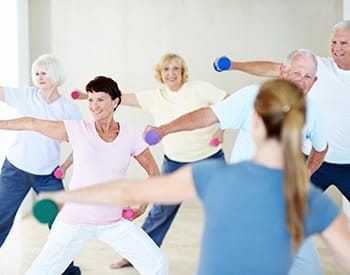 Group of our residents here at Grand Villa of Boynton Beach getting some low-impact exercise in one of the many classes offered at our senior living community in Florida