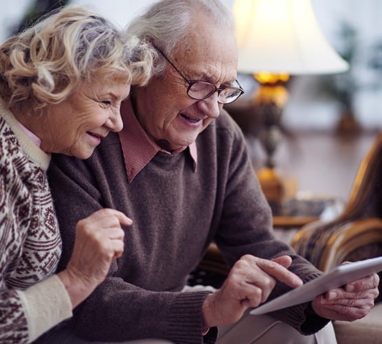 Senior couple ecstatic that they just signed up for a personal tour of Grand Villa of DeLand in Florida!