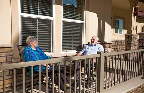 Senior couple enjoy the New Mexico sun on their patio.